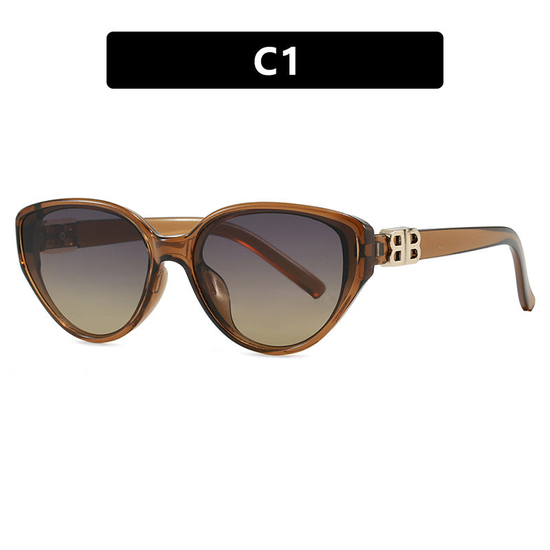 Dame modische Cat-Eye solbriller med elegant metallramme og UV-beskyttelse Skanto