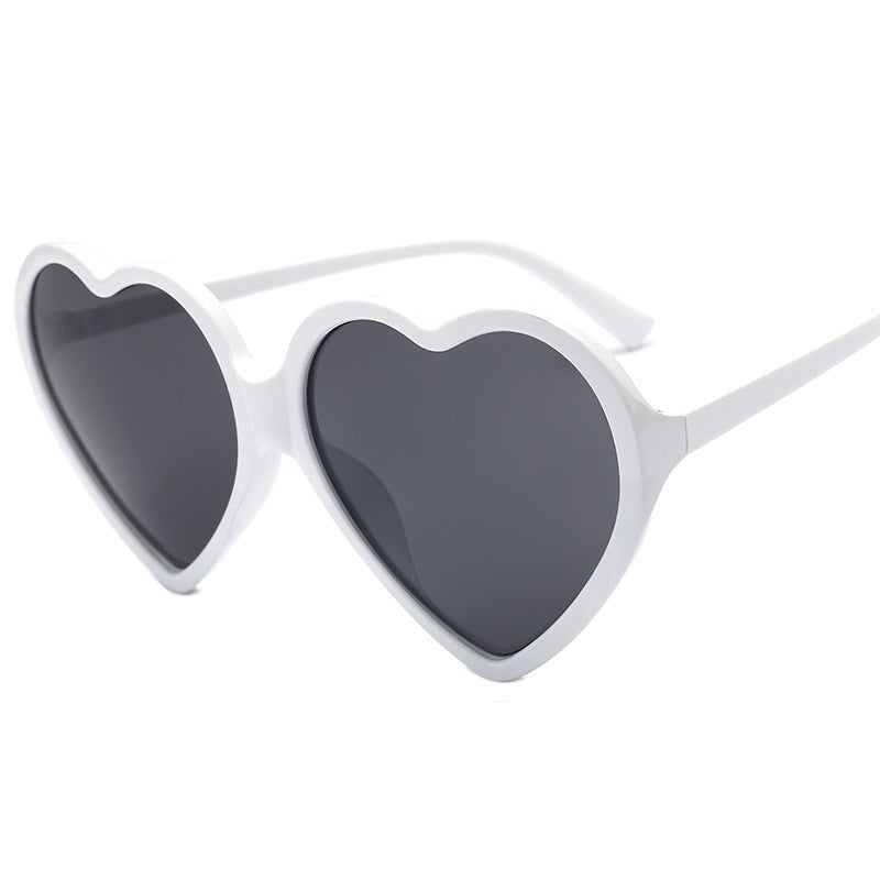 Dame hjerteformet solbrille med stilige rammer Skanto
