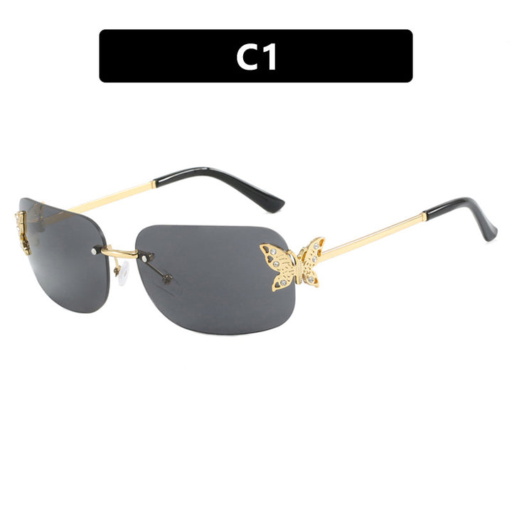 Dame moteriktig solbrille med filigran sommerfugldesign og beskyttende glass Skanto