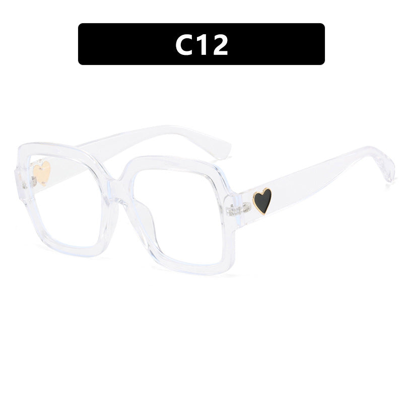 Dame firkantet solbrille med leken hjerte detalj Skanto