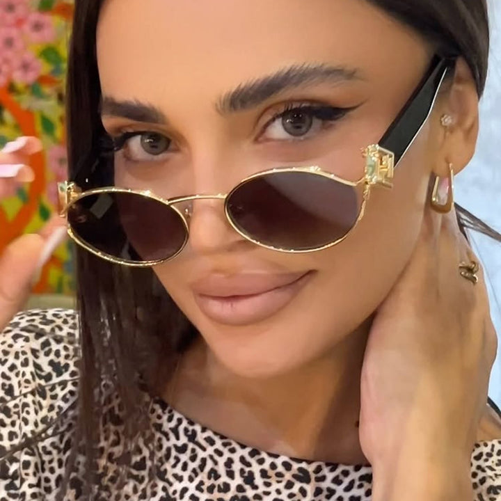 Dame moter solbrille med elegant metallramme og UV-beskyttelse Skanto