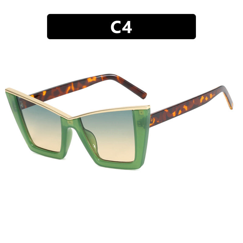 Dame moderne Cat-Eye solbriller med ekspressivt design og beskyttende UV-filter Skanto