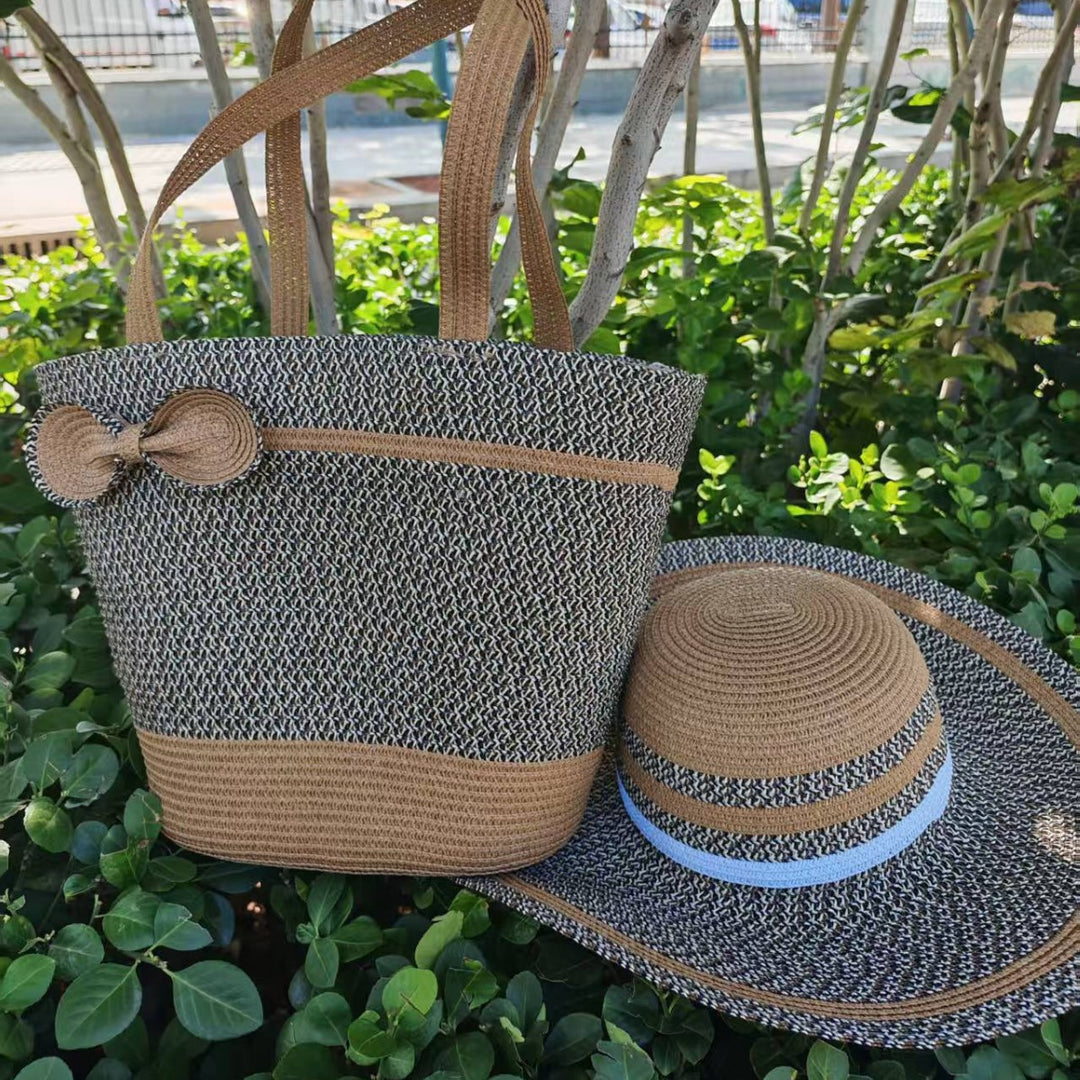 Elegante solhatt med bred brem og diskret stripemønster Skanto