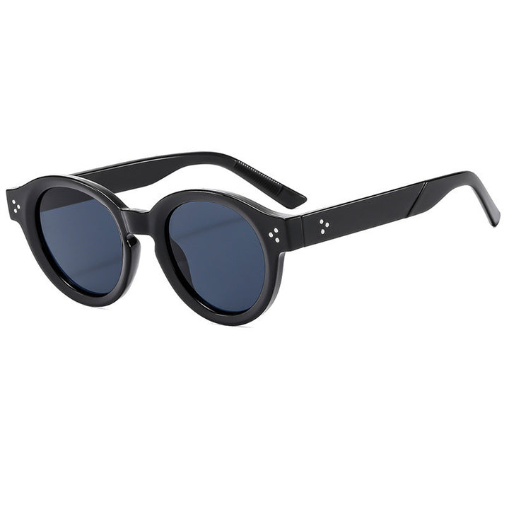 Dame moteriktig solbrille med klar og strukturert ramme Skanto