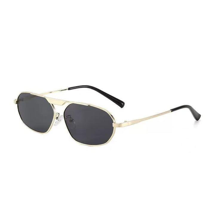 Dame moteriktig solbrille i elegant polygon-design Skanto
