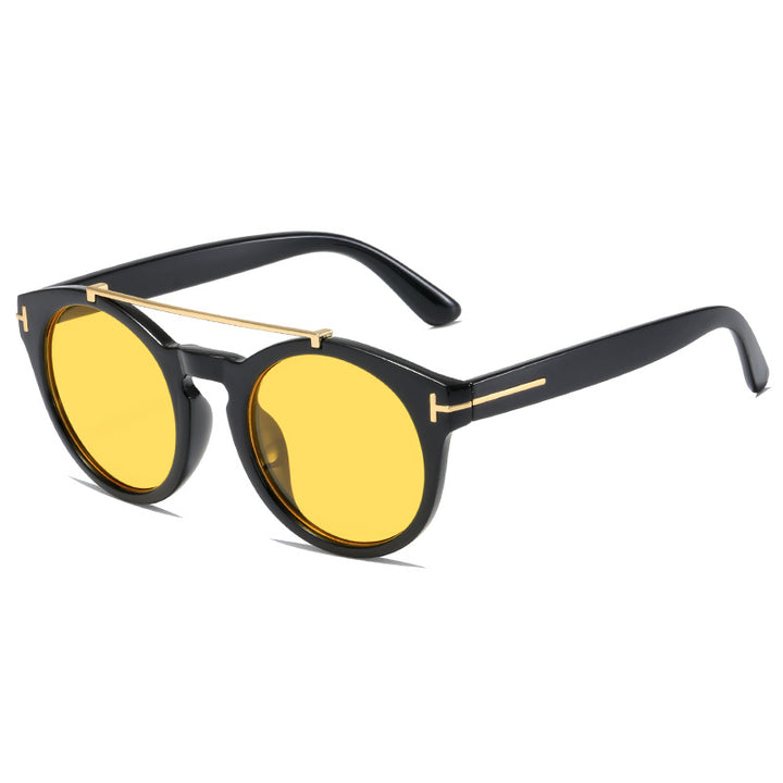 Dame fashionable solbriller med elegante runde glass Skanto