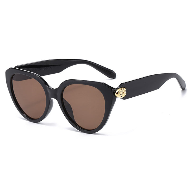 Dame Cat-Eye solbriller med gullige detaljer og beskyttende UV-filter Skanto
