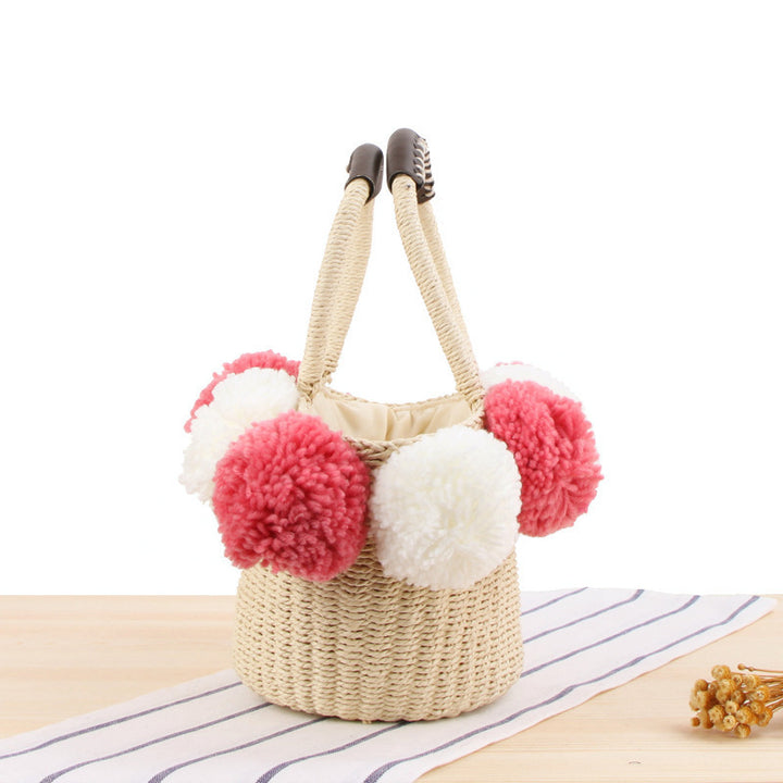 Basket bag with pompom decorated top Skanto