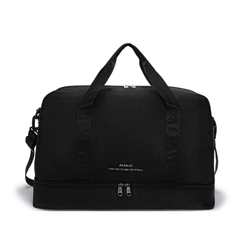 Sporty reisesekken med romslig innvendig rom og avtagbar skulderrem Skanto