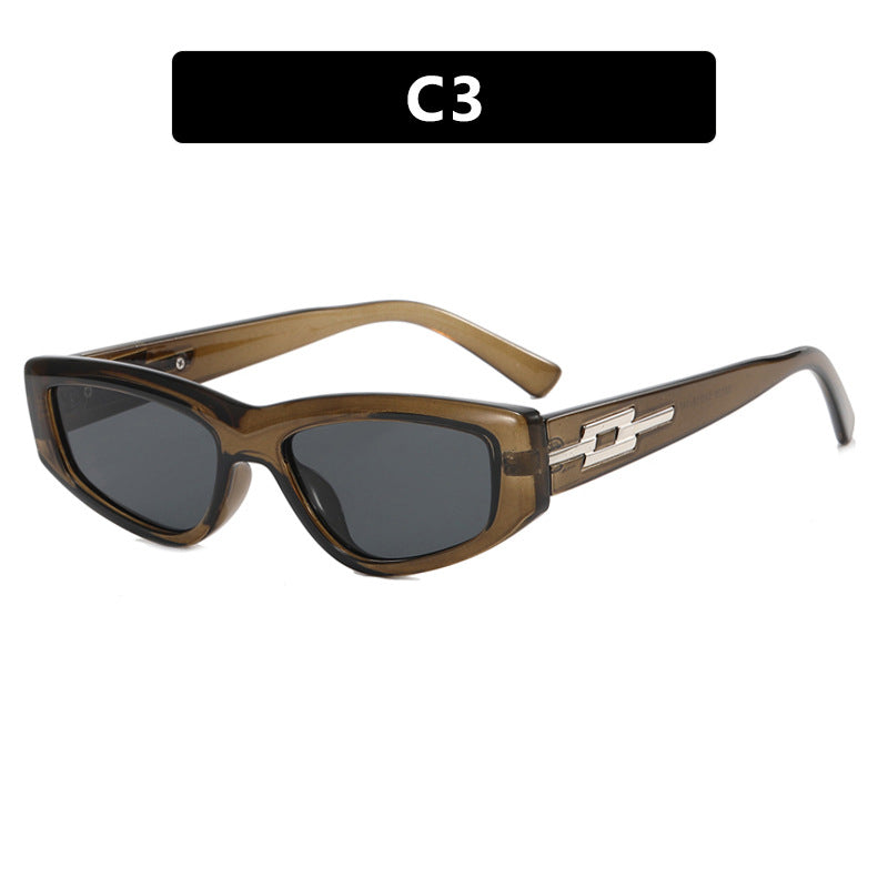 Dame moteriktig Cat-Eye solbrille med transparent ramme og kule glass Skanto