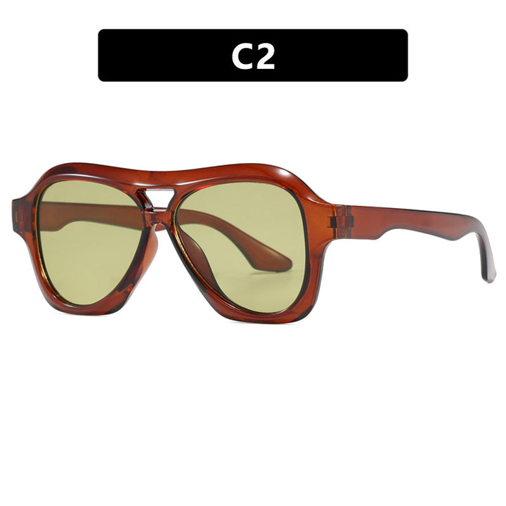 Dame moterik solbrille i innovativ design med bred ramme Skanto
