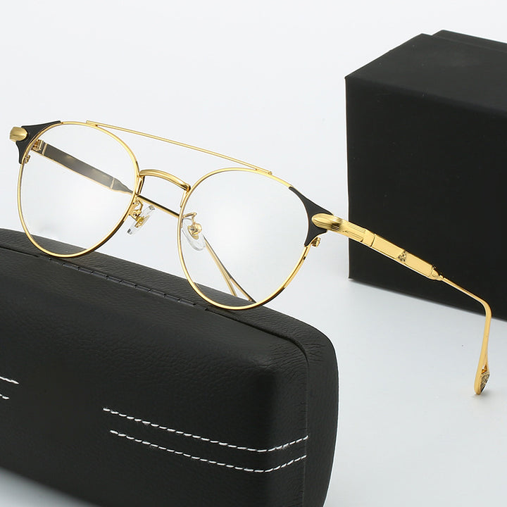 Dame rund Vintage-solbrille med høykvalitets metallramme og robust design Skanto