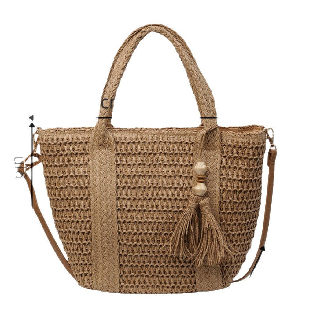 Flettet tote bag med dusker og skinn detaljer Skanto