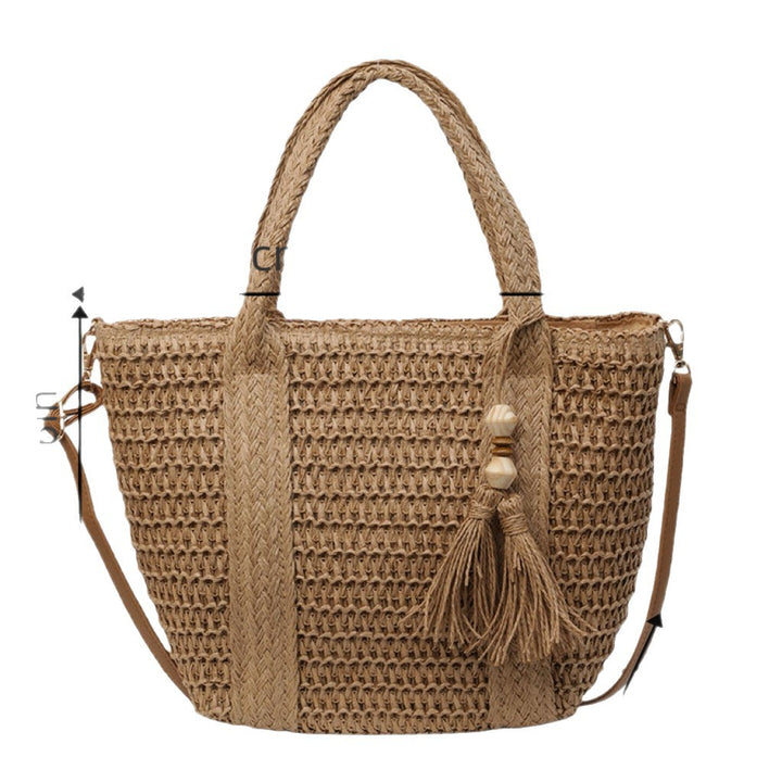 Flettet tote bag med dusker og skinn detaljer Skanto