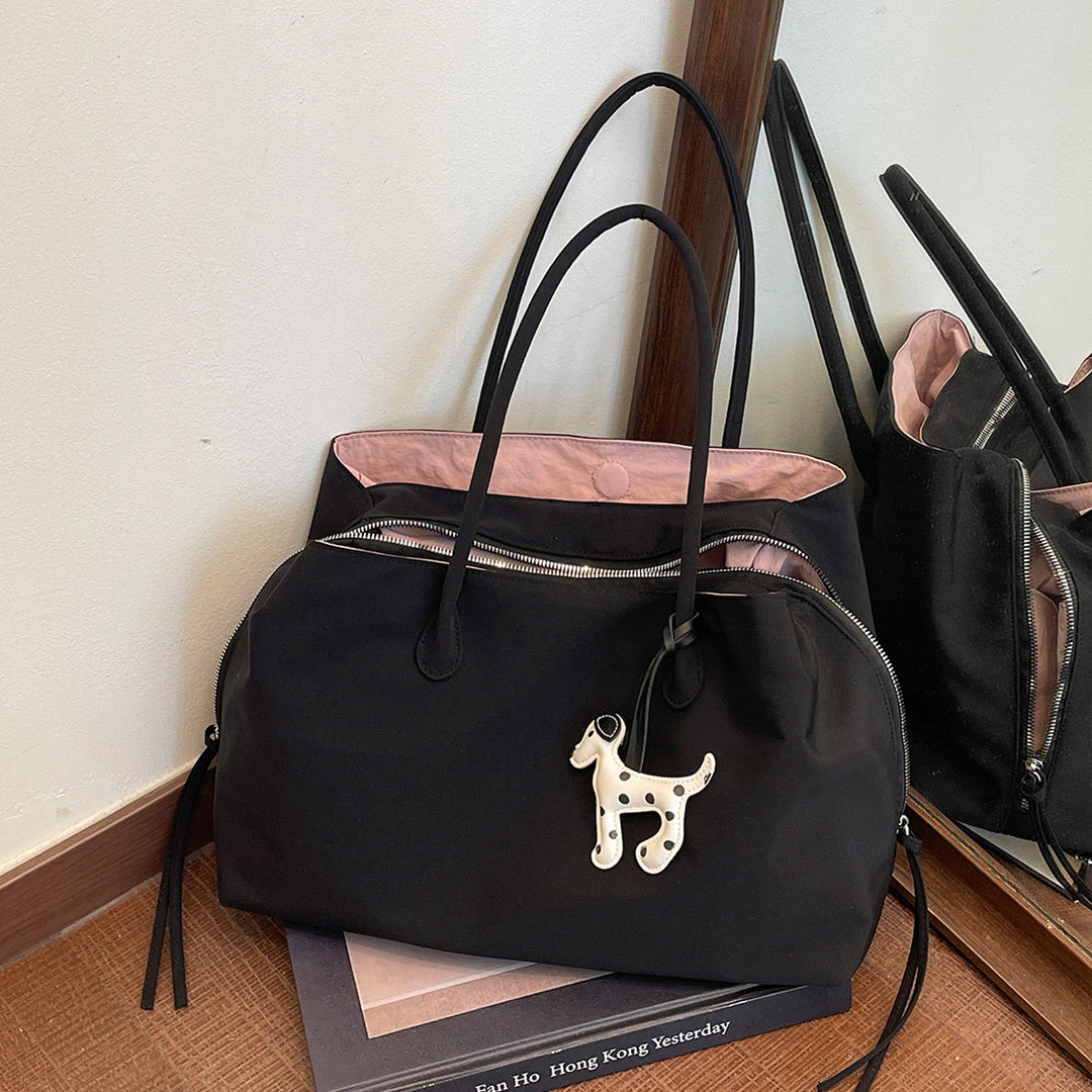 Elegant handveske med praktisk innvendig område Skanto