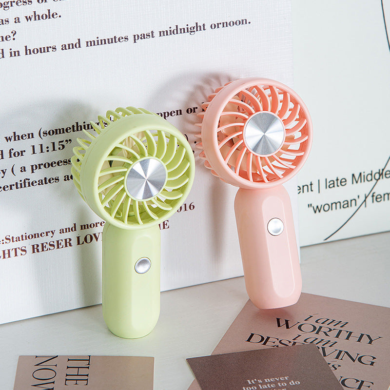 Dame Bærbar Mini Håndvifte med ergonomisk design og USB-ladefunksjon Skanto
