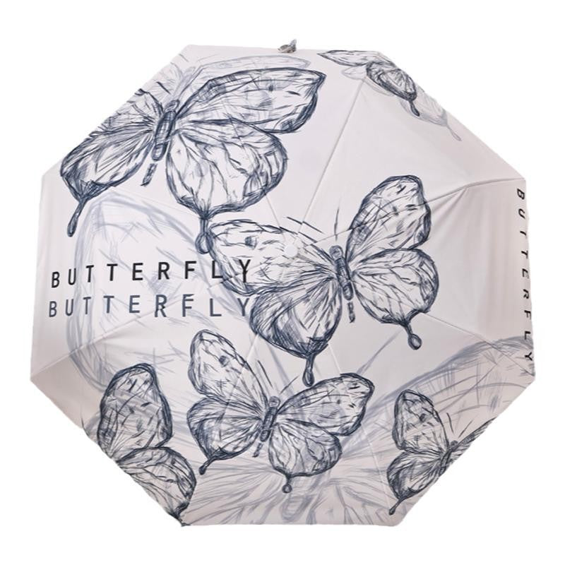 Dame fashionable foldeparaply med leken design Skanto