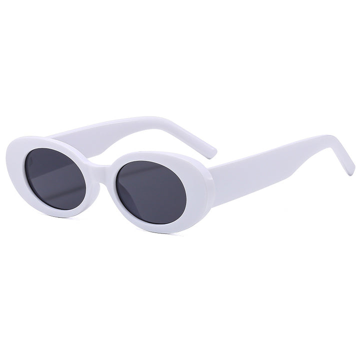 Dame modische solbrille med unik oval ramme Skanto