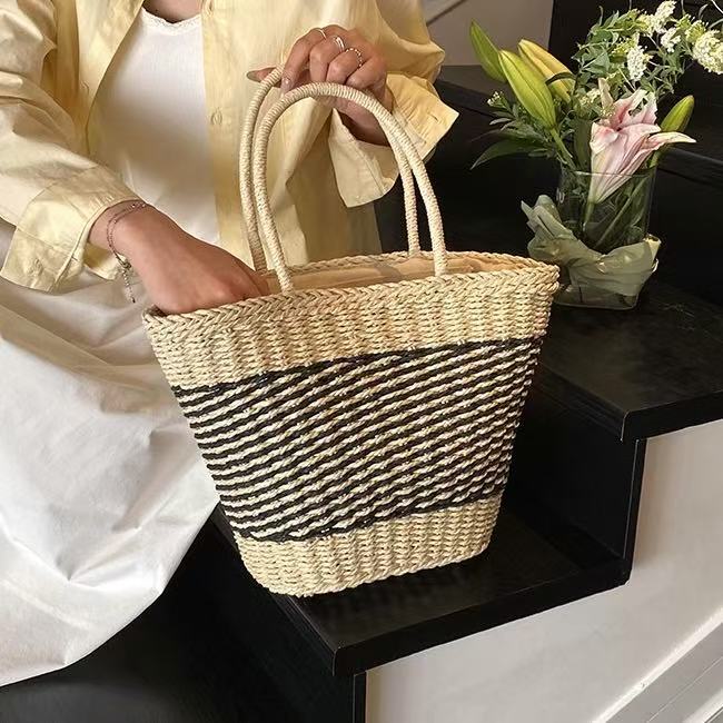 Håndveske i elegant bølgemønster Skanto