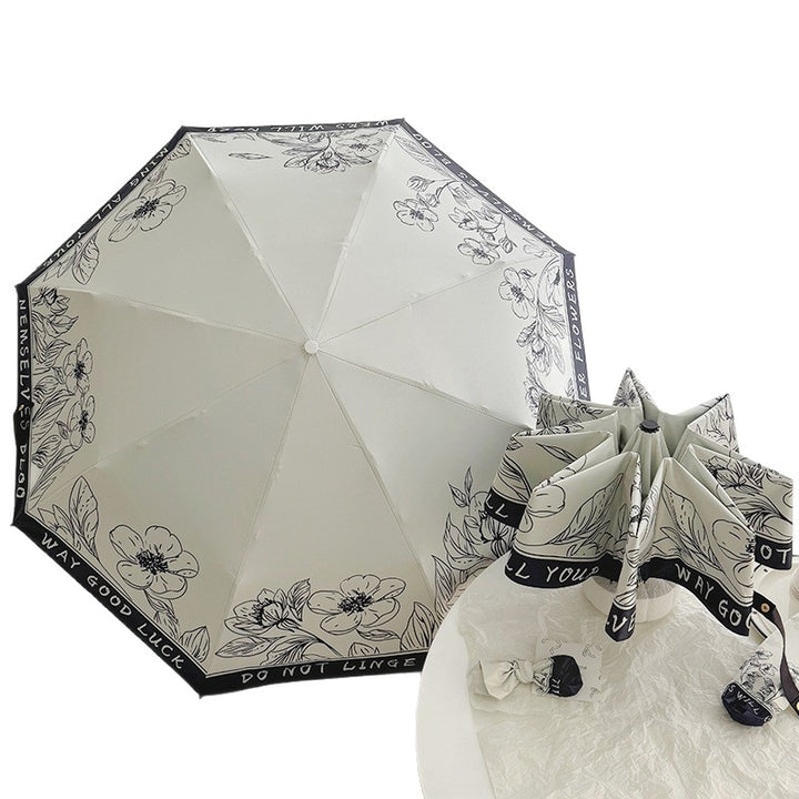Dame sammenleggbart paraply med kreativt kunstdesign Skanto