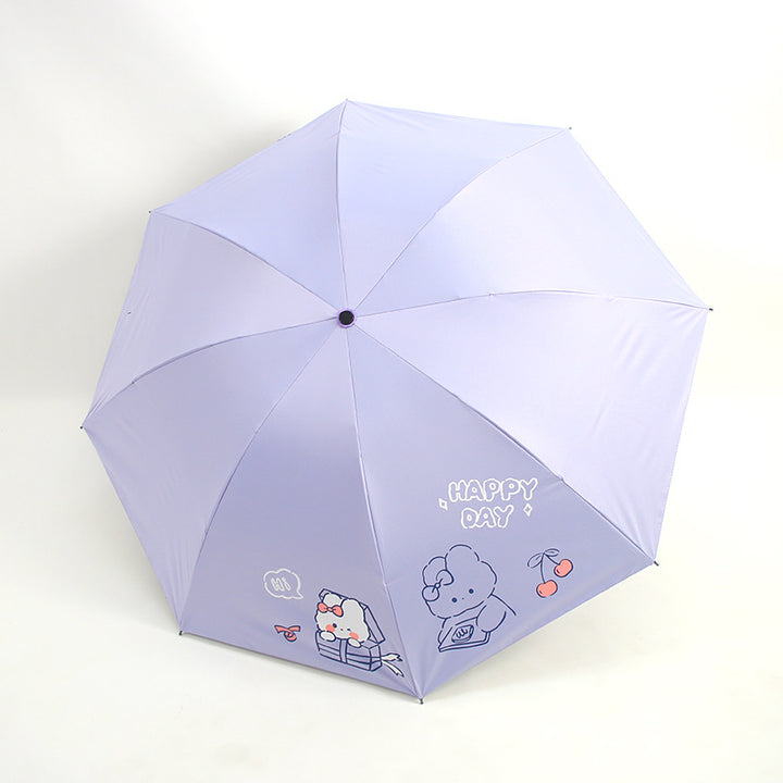 Damefoldingparaply med leken design og munter Skanto motiv
