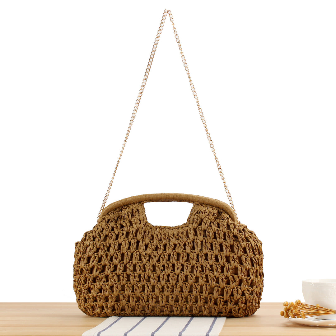 Beach shoulder bag made of natural weave with elegant chain decoration Skanto