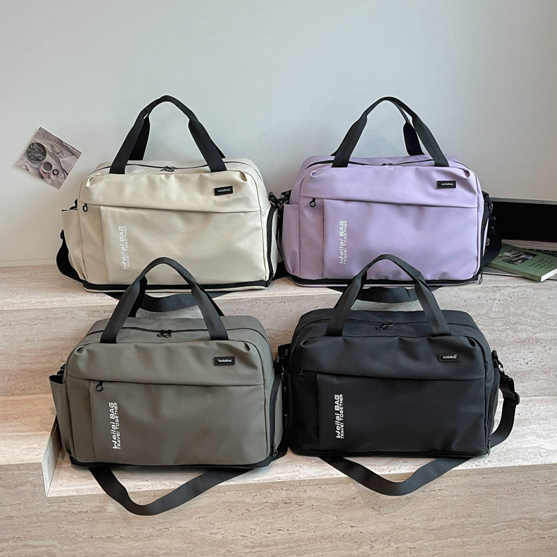 Reise- Og sportbag med vannavvisende materiale og mange lommer Skanto