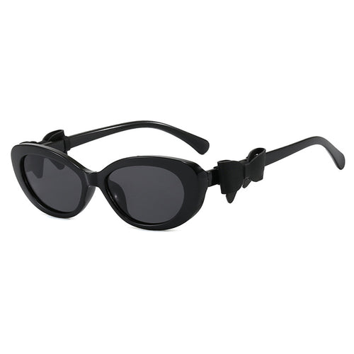 Dame moteriktig solbrille med lekent sløyfedesign Skanto