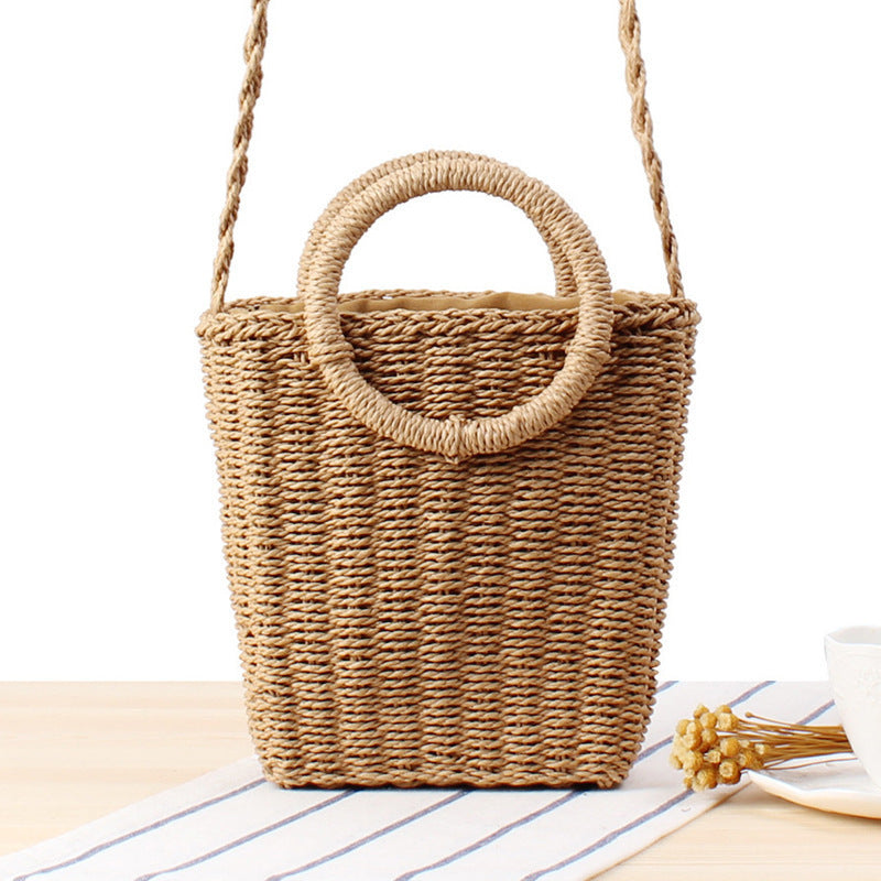 Woven natural material handbag with round handle Skanto