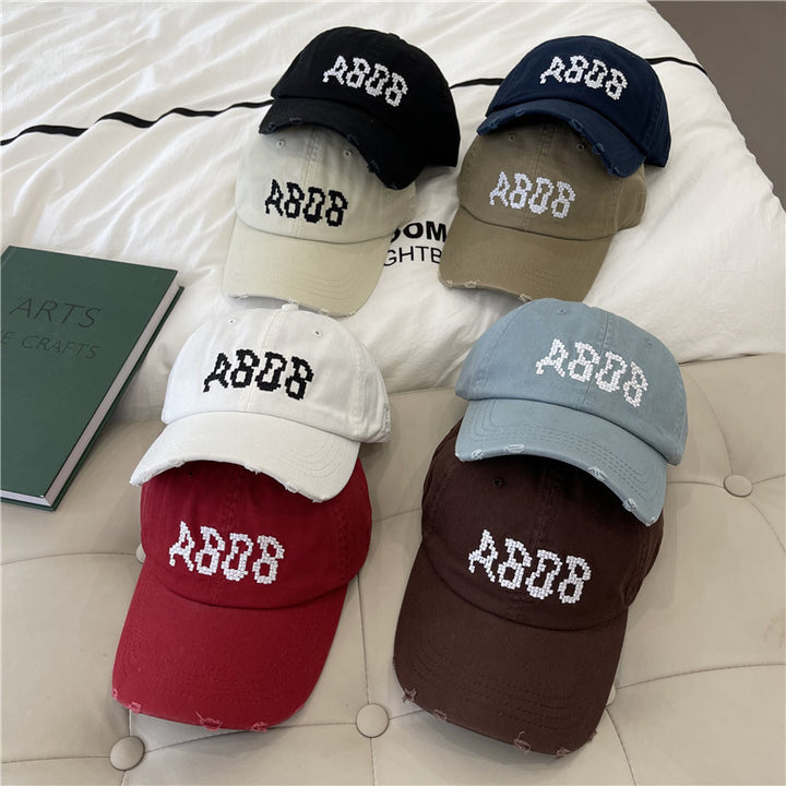 Kvinnens slitte bomull baseballcaps med grafisk detaljer Skanto