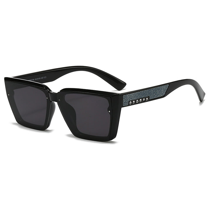 Dame stilig solbrille med glitrende detaljer Skanto