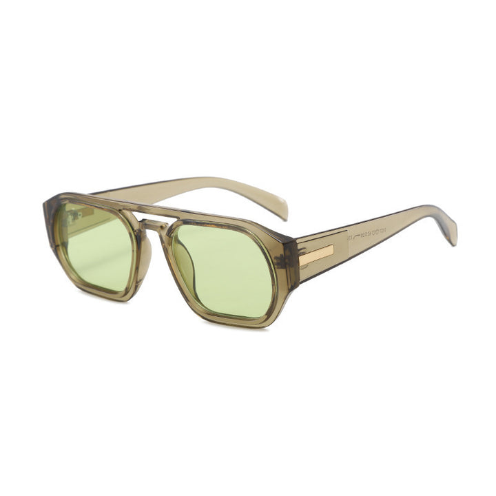 Dame moteriktig rektangulær brille med elegant metalled accent Skanto