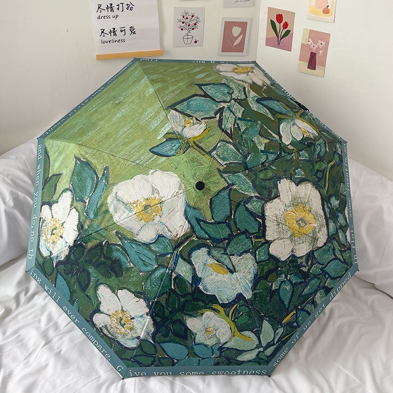 Damer sammenleggbart paraply med florale accenter Skanto