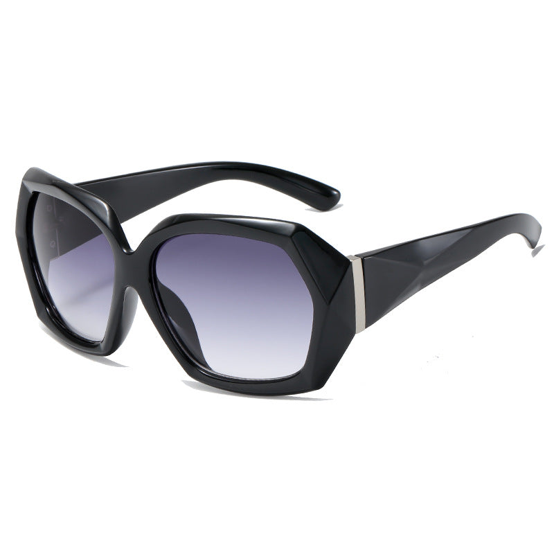 Dame Designer-solbrille i innovativ polygon-design Skanto