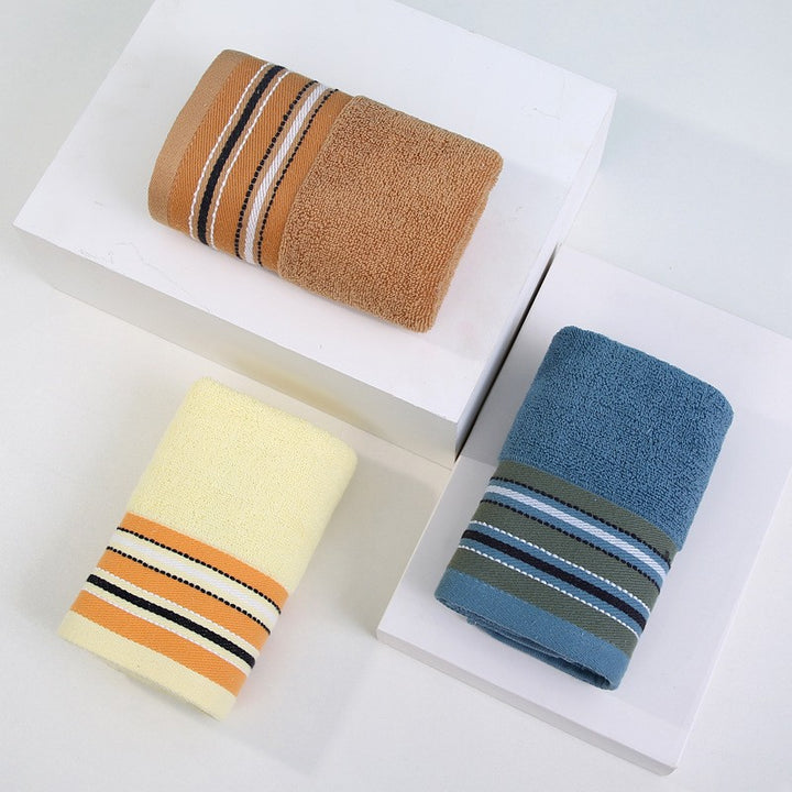 Premium terry towel with elegant stripe border.