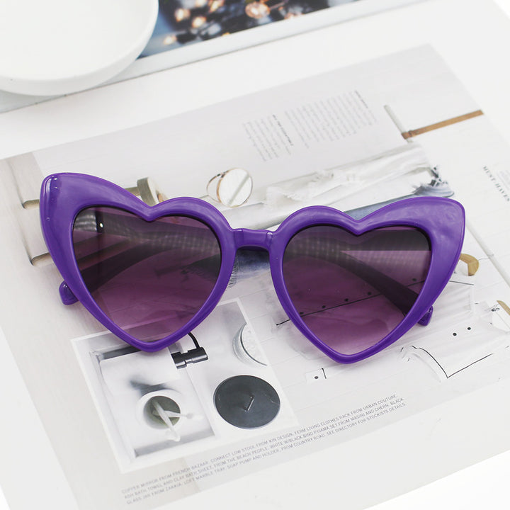 Dame hjerteformet solbrille med glitrende ramme Skanto