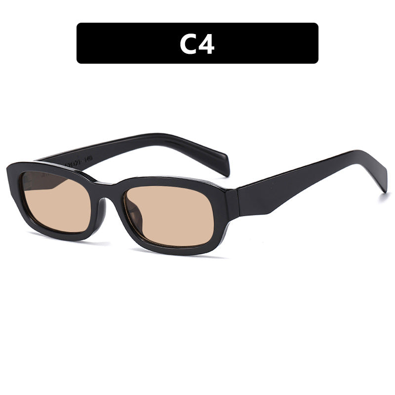 Dame moteriktig solbrille med stilfull, rektangulær ramme Skanto