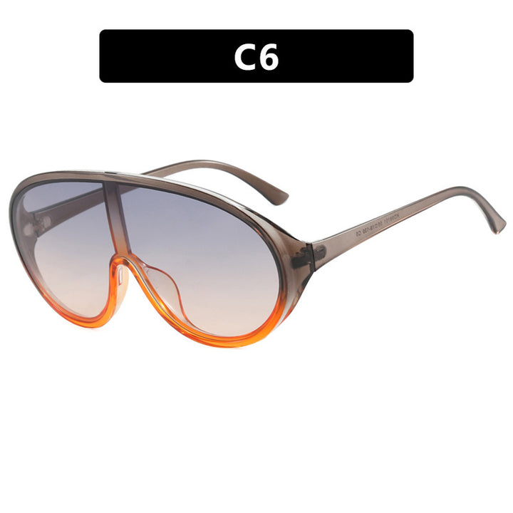 Dame futuristisk solbrille med store glass og ergonomisk ramme Skanto