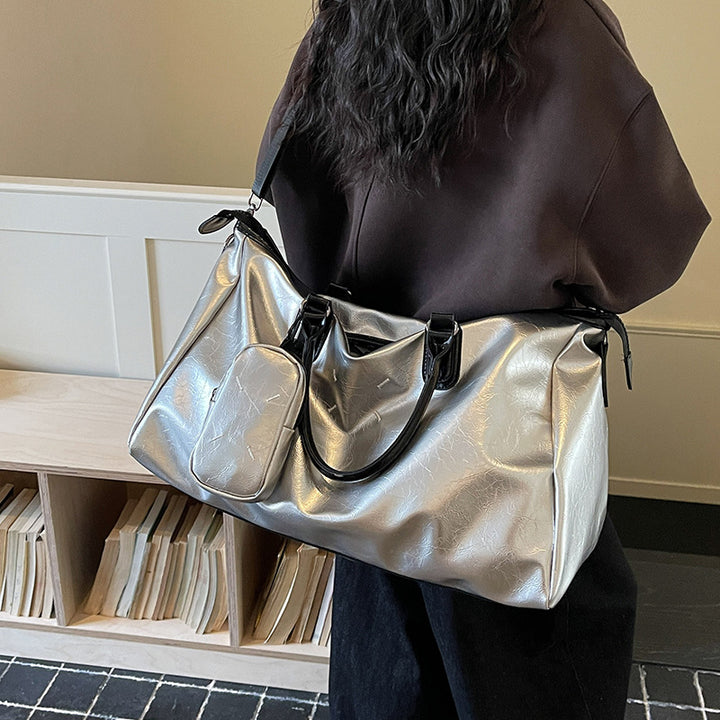 Elegant reiseveske i høykvalitets kunstlær Skanto