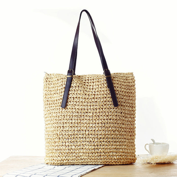 Handbag made of handmade natural material with sturdy leather handles Skanto