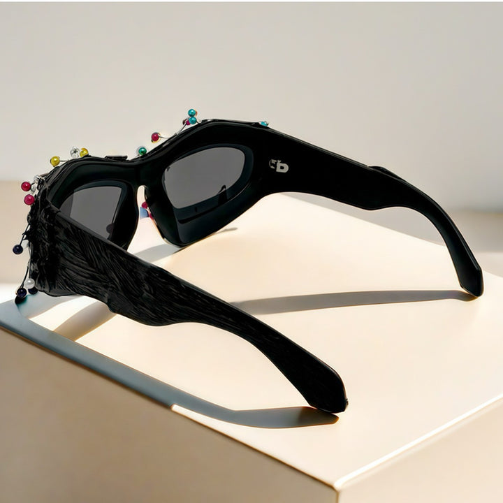Dame Kreativ Design-solbrille med innovativ akcent Skanto