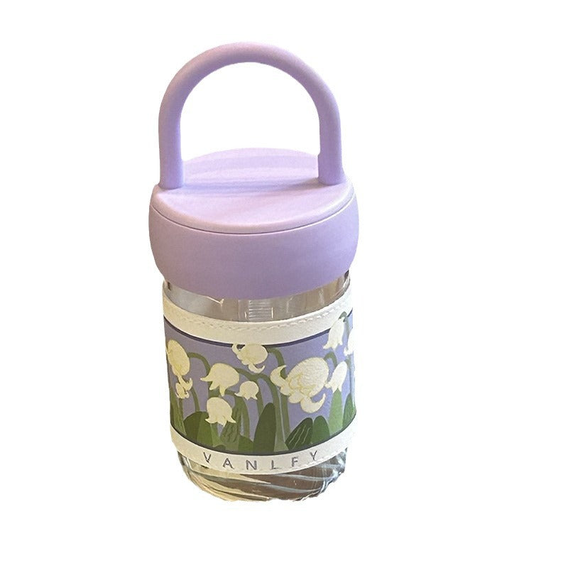 Dame isolerende drikkeflaske med ergonomisk håndtak og elegant blomsterdesign Skanto