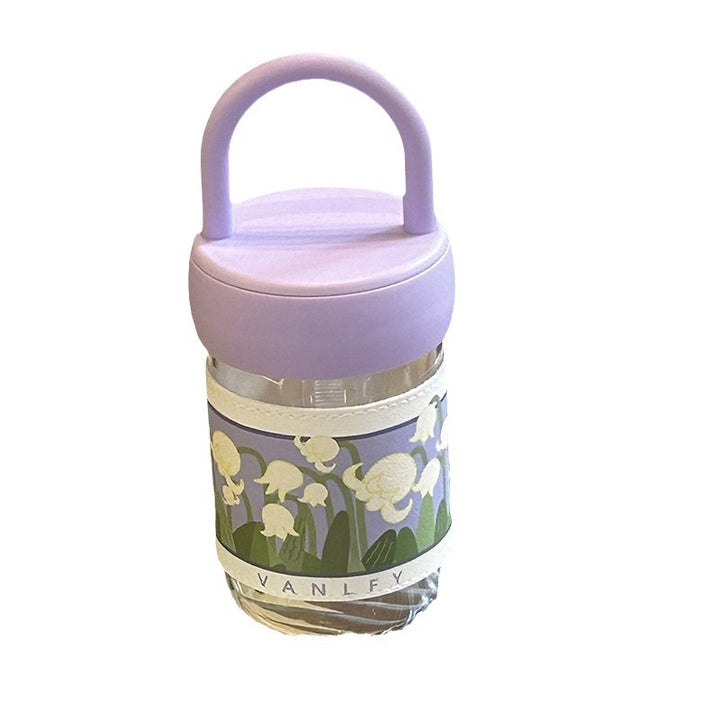 Dame isolerende drikkeflaske med ergonomisk håndtak og elegant blomsterdesign Skanto