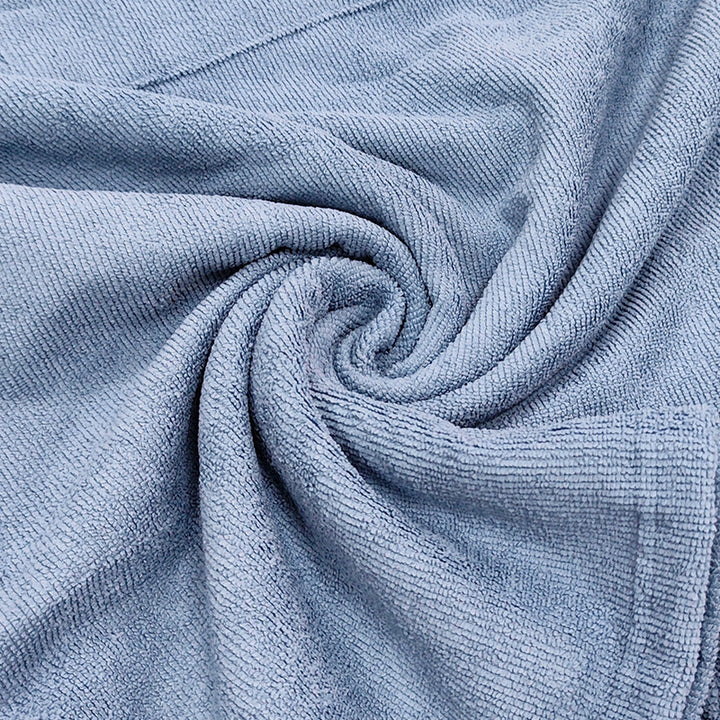 Dame hetteponcho av myk mikrofiberstoff Skanto