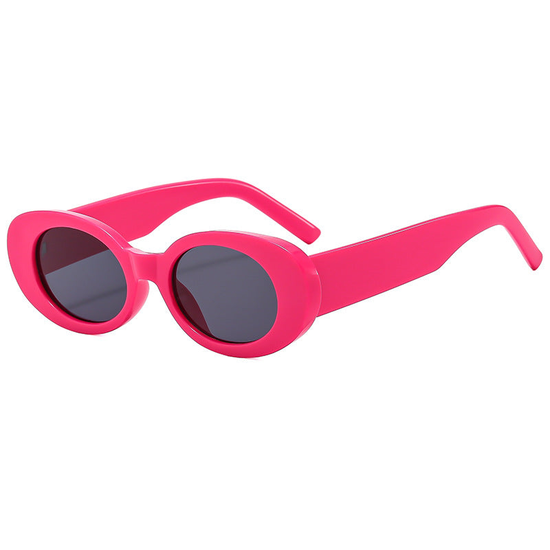 Dame modische solbrille med unik oval ramme Skanto