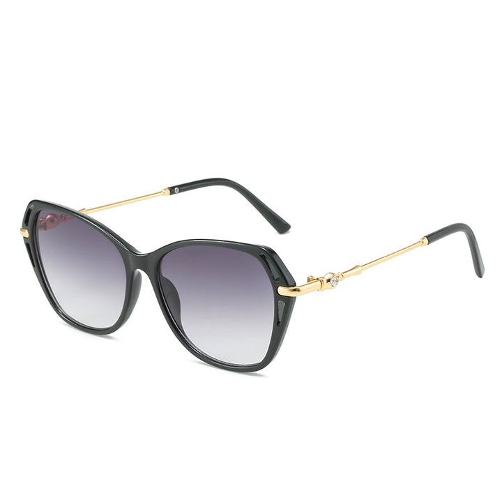 Dame moter Cat-Eye solbrille med elegant metallramme Skanto