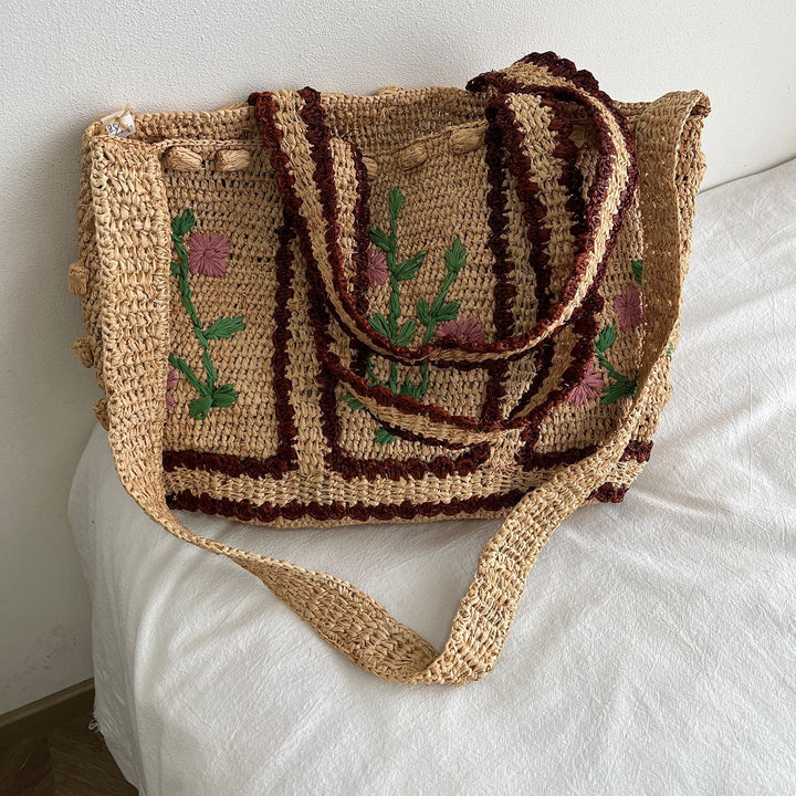 Flettet skulderveske med blomsterdesign Skanto