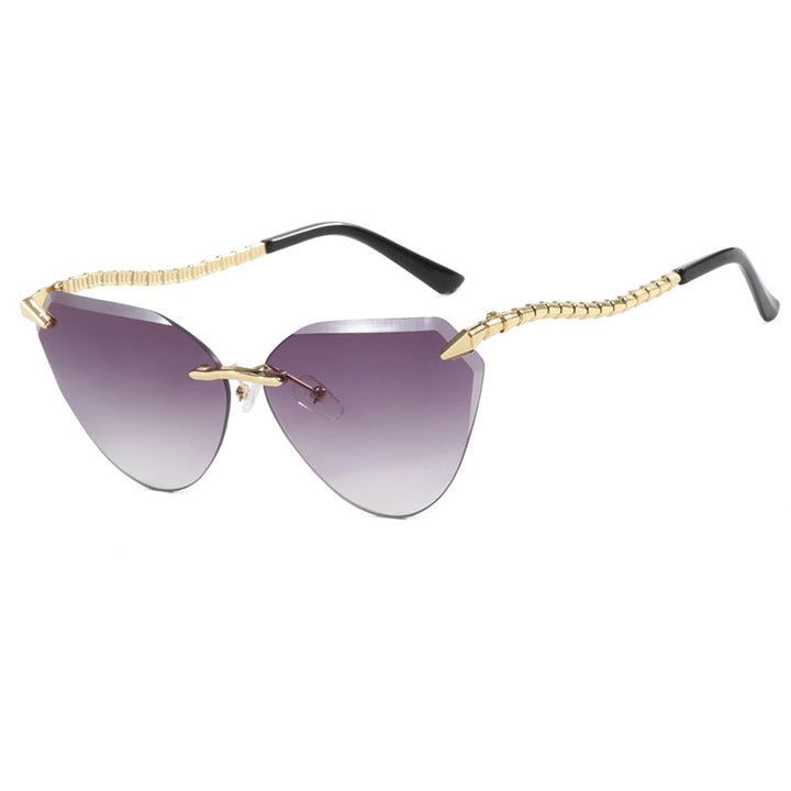 Dame Cat-Eye solbriller med unikt gullrammedesign og beskyttende linser Skanto