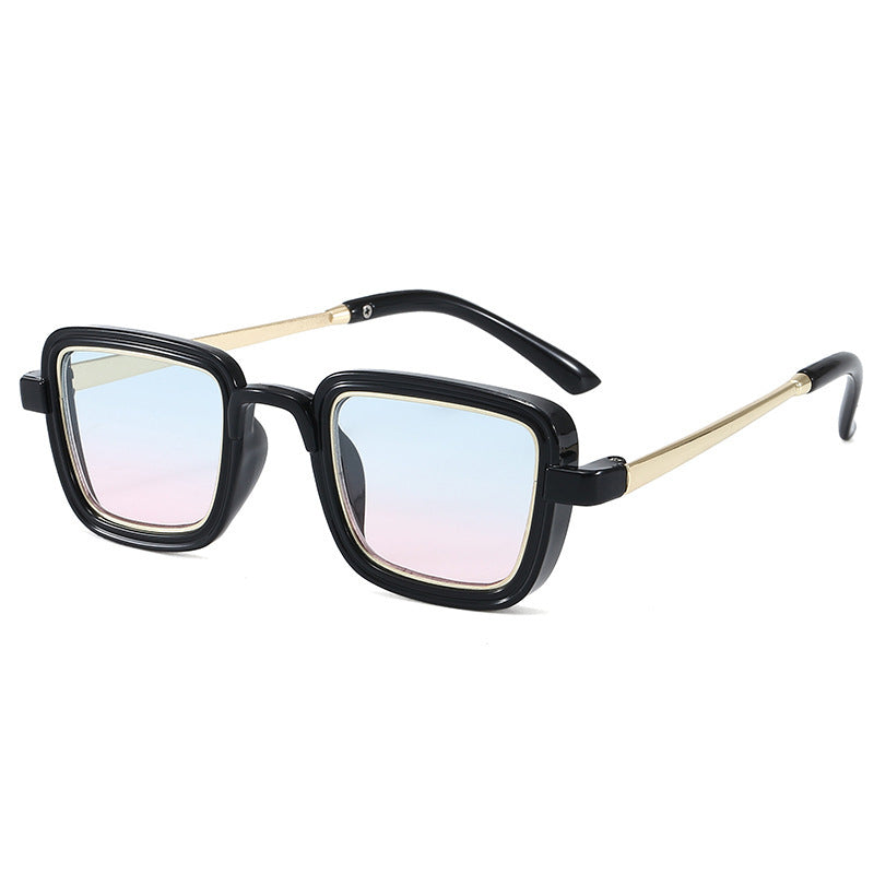 Dame firkantet solbrille med gjennomsiktig ramme og gyldne detaljer Skanto