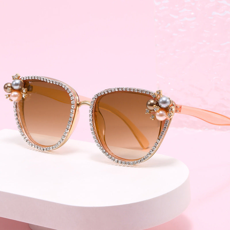 Dame glamorøs solbrille med perle- og krystaldekorasjon Skanto